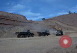 Image of dump trucks Vietnam, 1965, second 13 stock footage video 65675024801