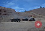 Image of dump trucks Vietnam, 1965, second 14 stock footage video 65675024801