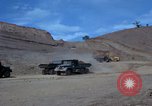 Image of dump trucks Vietnam, 1965, second 16 stock footage video 65675024801