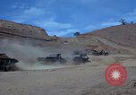 Image of dump trucks Vietnam, 1965, second 18 stock footage video 65675024801