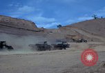 Image of dump trucks Vietnam, 1965, second 19 stock footage video 65675024801