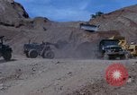 Image of dump trucks Vietnam, 1965, second 25 stock footage video 65675024801