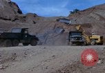 Image of dump trucks Vietnam, 1965, second 28 stock footage video 65675024801