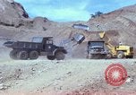 Image of dump trucks Vietnam, 1965, second 29 stock footage video 65675024801