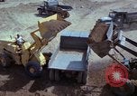 Image of dump trucks Vietnam, 1965, second 31 stock footage video 65675024801