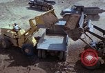 Image of dump trucks Vietnam, 1965, second 32 stock footage video 65675024801