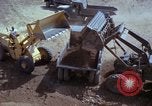 Image of dump trucks Vietnam, 1965, second 34 stock footage video 65675024801