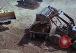 Image of dump trucks Vietnam, 1965, second 36 stock footage video 65675024801