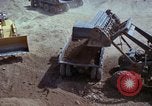 Image of dump trucks Vietnam, 1965, second 37 stock footage video 65675024801