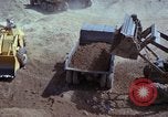Image of dump trucks Vietnam, 1965, second 38 stock footage video 65675024801