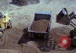 Image of dump trucks Vietnam, 1965, second 39 stock footage video 65675024801