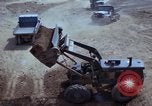 Image of dump trucks Vietnam, 1965, second 43 stock footage video 65675024801