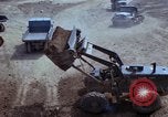 Image of dump trucks Vietnam, 1965, second 44 stock footage video 65675024801