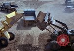 Image of dump trucks Vietnam, 1965, second 46 stock footage video 65675024801