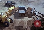 Image of dump trucks Vietnam, 1965, second 47 stock footage video 65675024801