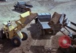 Image of dump trucks Vietnam, 1965, second 49 stock footage video 65675024801