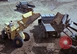 Image of dump trucks Vietnam, 1965, second 50 stock footage video 65675024801