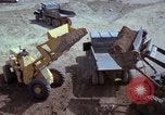 Image of dump trucks Vietnam, 1965, second 51 stock footage video 65675024801