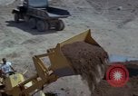Image of dump trucks Vietnam, 1965, second 52 stock footage video 65675024801