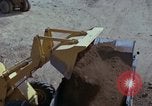 Image of dump trucks Vietnam, 1965, second 53 stock footage video 65675024801