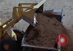 Image of dump trucks Vietnam, 1965, second 54 stock footage video 65675024801