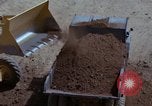 Image of dump trucks Vietnam, 1965, second 55 stock footage video 65675024801