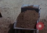 Image of dump trucks Vietnam, 1965, second 56 stock footage video 65675024801