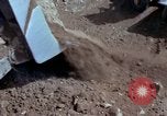 Image of dump trucks Vietnam, 1965, second 60 stock footage video 65675024801
