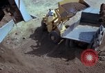 Image of dump trucks Vietnam, 1965, second 62 stock footage video 65675024801