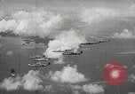 Standbild japanische Streitkräfte Angriff in Niederländisch Ostindien Celebes, 1942, aus Sekunde 22 historischem Filmmaterial Videoclip 65675024828