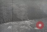 Standbild japanische Streitkräfte Angriff in Niederländisch Ostindien Celebes, 1942, aus Sekunde 33 historischem Filmmaterial Videoclip 65675024828