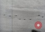 Standbild japanische Streitkräfte Angriff in Niederländisch Ostindien Celebes, 1942, aus Sekunde 58 historischem Filmmaterial Videoclip 65675024828