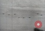 Standbild japanische Streitkräfte Angriff in Niederländisch Ostindien Celebes, 1942, aus Sekunde 60 historischem Filmmaterial Videoclip 65675024828