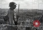 Immagine di Generale giapponese Mutaguchi Renya paga rispetti ai soldati caduti Singapore, 1942, secondo 53 filmato di repertorio 65675024830