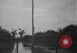 Image of Japanese troops in river operations near Canton China, 1939, second 44 stock footage video 65675024832