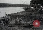 Image of Japanese troops in river operations near Canton China, 1939, second 48 stock footage video 65675024832