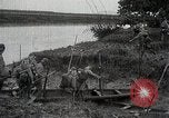 Image of Japanese troops in river operations near Canton China, 1939, second 49 stock footage video 65675024832