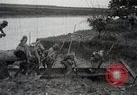 Image of Japanese troops in river operations near Canton China, 1939, second 51 stock footage video 65675024832