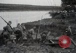 Image of Japanese troops in river operations near Canton China, 1939, second 53 stock footage video 65675024832