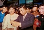 Standbild Messe Osaka Japan, 1962, aus Sekunde 57 historischem Filmmaterial Videoclip 65675024908