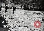Image of long boats navigate rapids Japan, 1898, second 6 stock footage video 65675024930