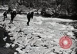 Image of long boats navigate rapids Japan, 1898, second 7 stock footage video 65675024930