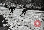 Image of long boats navigate rapids Japan, 1898, second 9 stock footage video 65675024930