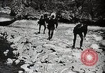 Image of long boats navigate rapids Japan, 1898, second 11 stock footage video 65675024930