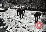 Image of long boats navigate rapids Japan, 1898, second 12 stock footage video 65675024930