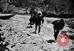Image of long boats navigate rapids Japan, 1898, second 13 stock footage video 65675024930