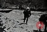 Image of long boats navigate rapids Japan, 1898, second 14 stock footage video 65675024930