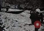 Image of long boats navigate rapids Japan, 1898, second 17 stock footage video 65675024930