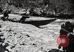 Image of long boats navigate rapids Japan, 1898, second 19 stock footage video 65675024930