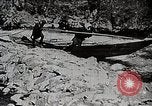 Image of long boats navigate rapids Japan, 1898, second 21 stock footage video 65675024930